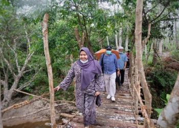 Bupati Masnah Kunjungi Objek Wisata Sungai Napal Desa Muhajirin